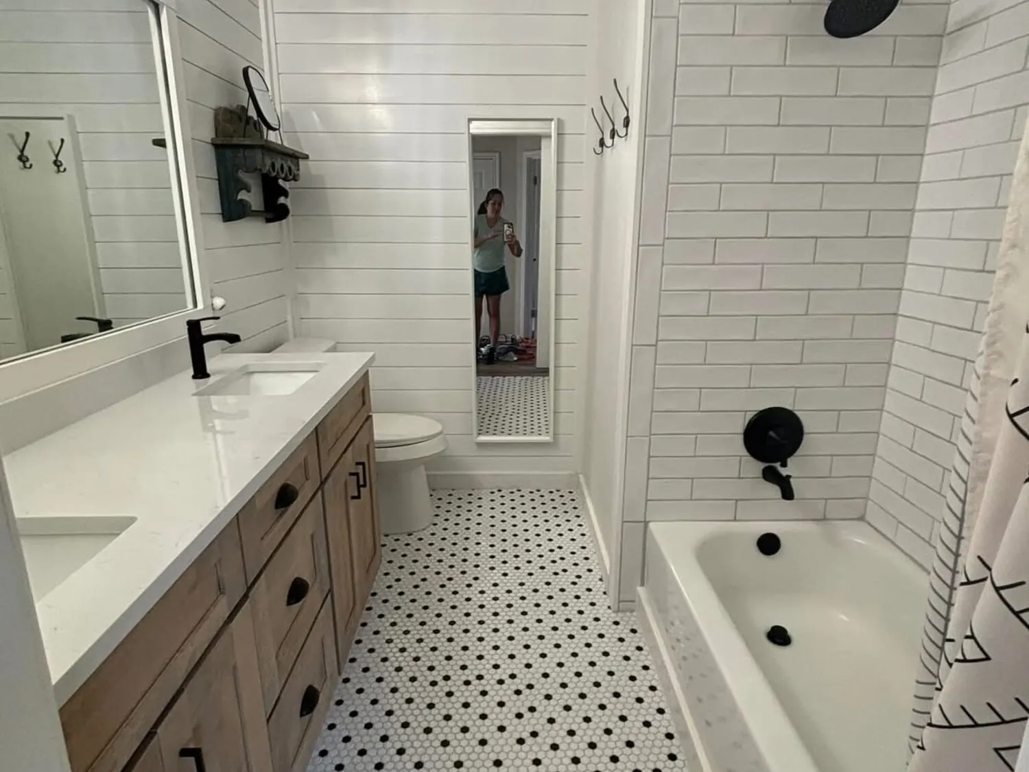 Bathroom after remodel with tub and tile